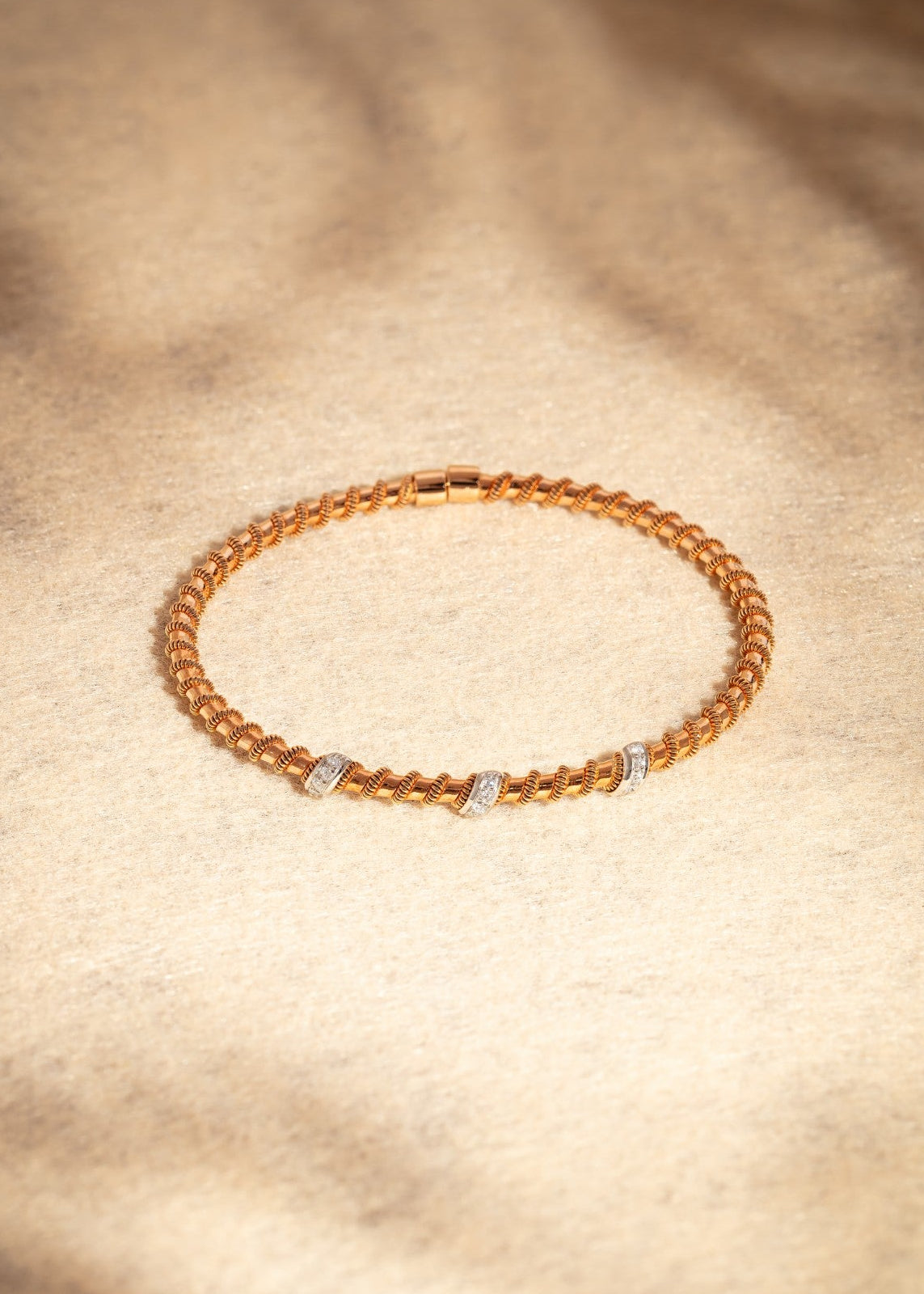 The Tubogas Twiddles Bangle with Diamonds