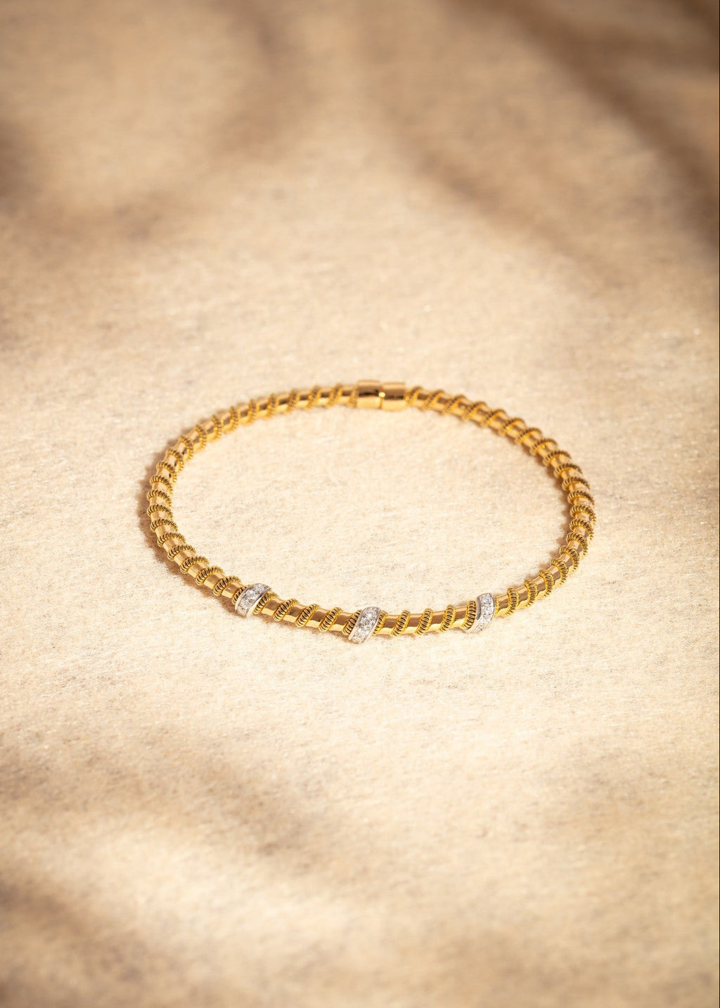 The Tubogas Twiddles Bangle with Diamonds