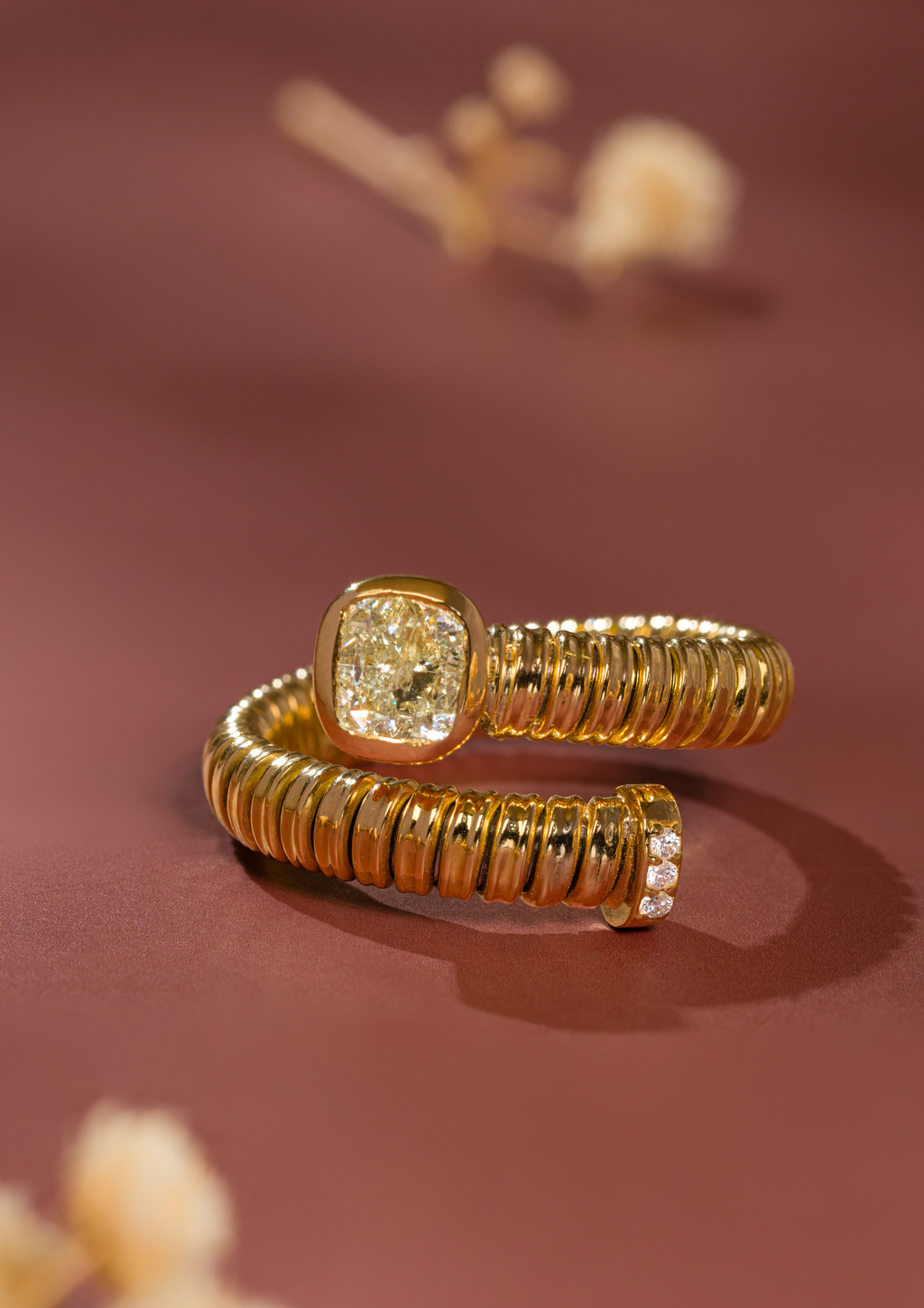 Tubogas Cross Over Ring with Cushion Diamond